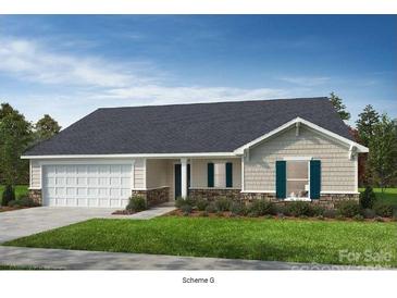 Charming one-story home with stone accents, green shutters and attached two car garage at Lot#143 Norwood Ct, Denver, NC 28037