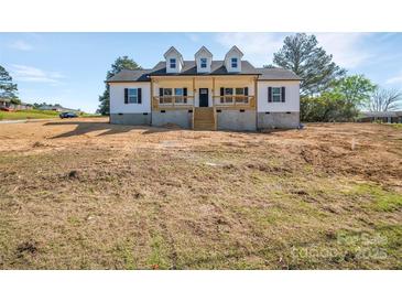 Charming new construction featuring a welcoming front porch and classic design on a spacious lot at 504 Christopher Ln, Chester, SC 29706