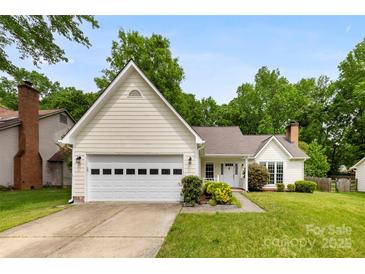 Charming single-Gathering home with a manicured lawn, attached garage, and inviting curb appeal at 13324 Kintyre Ct, Matthews, NC 28105