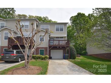 Charming townhome with front porch, garage, and well-maintained landscaping at 139 High Ridge Rd, Mooresville, NC 28117