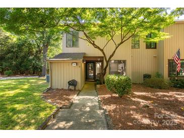 Charming townhome featuring mature trees and landscaped front entrance at 194 Riverview Ter, Clover, SC 29710