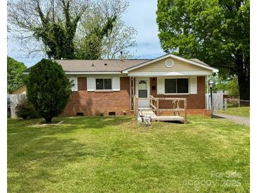 Charming brick home with a well-maintained front yard and classic white trim at 4623 Monmouth Dr, Charlotte, NC 28269