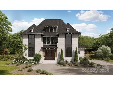 Stunning two-story home boasts elegant design, black framed windows, and a welcoming entrance, surrounded by lush landscaping at 1437 Montford Dr, Charlotte, NC 28209