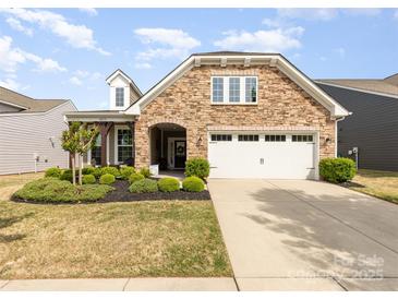 Charming single-Gathering home featuring a stone facade and well-maintained landscaping at 4019 Channel Islands Way, Lancaster, SC 29720