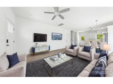 Bright living room featuring stylish furnishings, modern decor, and an open floor plan at 3048 Goble St, Gastonia, NC 28056