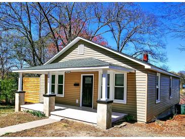 Charming single-story home with a covered front porch and neutral siding at 606 Childs St, Lincolnton, NC 28092