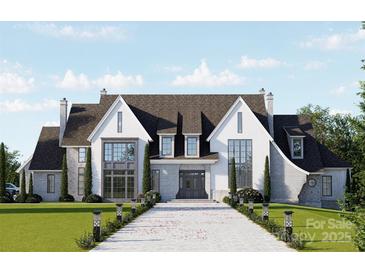 Majestic new home with a beautifully landscaped lawn and grand entrance at 8716 Ruby Hill Ct, Waxhaw, NC 28173