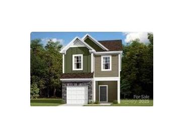 Charming two-story home featuring a modern design, neutral colors, and inviting curb appeal at 1133 Overbrook Pl, Wingate, NC 28174