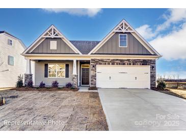 Charming single-Gathering home with a two-car garage, craftsman details and beautiful stone accents at 1436 Ardmore Dr # 342, Sherrills Ford, NC 28673