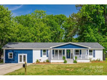 Charming single-story home showcasing a well-maintained lawn and inviting porch at 1090 Bowser St, Rock Hill, SC 29730