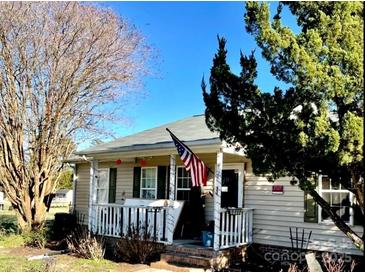 Charming single-story home with a welcoming porch and well-maintained landscaping at 2473 Greenwood Rd, Rock Hill, SC 29730