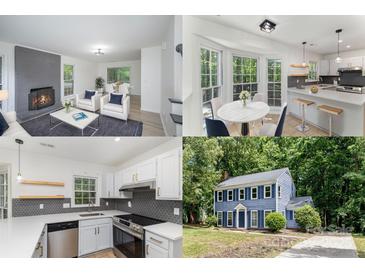Bright home showcases a living room with fireplace, breakfast nook, and modern kitchen in an open layout at 7212 Canyon Dr, Charlotte, NC 28262