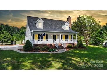 Charming two-story home with a welcoming front porch and beautifully landscaped front yard at 1920 Williford Woods Ln # 5, Rock Hill, SC 29730
