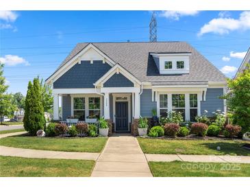Charming craftsman-style home with well-manicured lawn and inviting front porch at 3588 County Down Ave, Kannapolis, NC 28081