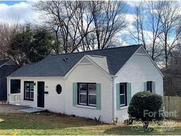 Charming single-story home featuring a well-maintained lawn and inviting curb appeal at 523 Franklin Ave, Charlotte, NC 28206