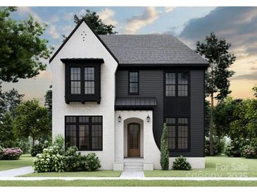 Charming two-story home features a contrasting color scheme and attractive architectural detailing at 1115 West Blvd, Charlotte, NC 28208