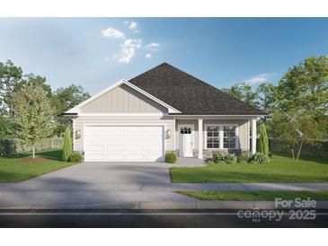 Charming single-story home featuring a one car garage, manicured lawn, and classic architectural details at Lot 18 Contentment Ct, Kannapolis, NC 28081