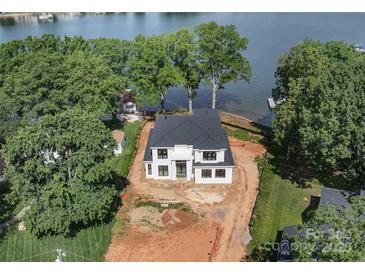 New construction home boasting modern design near the water at 242 Shoreline Loop, Mooresville, NC 28117