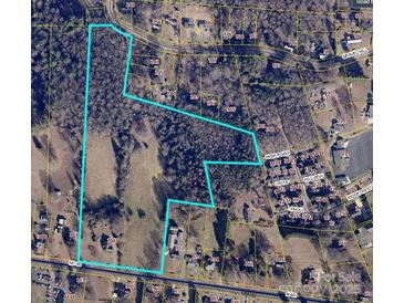Large parcel of land offering a serene mix of wooded areas and open fields for building at 1040 Nc 90 W Hwy, Taylorsville, NC 20681