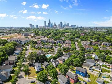Stunning aerial view of the community with the city skyline in the background, perfect location near the city at 1821 Ethel Guest Ln, Charlotte, NC 28206
