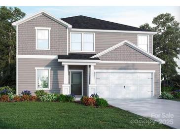 Charming two-story home featuring a gray exterior, landscaped front yard, and an attached two-car garage at 1505 Harper Landing Blvd, Stanley, NC 28164