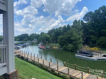 Picturesque waterfront view featuring a private boat dock with ample boat parking at 104 Pier 33 Dr # 311, Mooresville, NC 28117