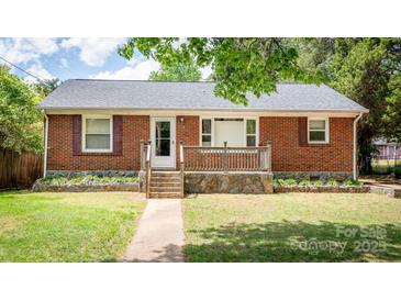 Charming single-story brick home with a stone foundation and inviting front porch at 734 Club Dr, Statesville, NC 28677