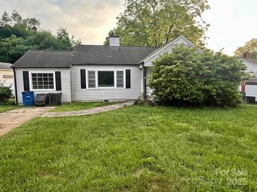 Charming single-story home with a yard and classic architectural details, ready for your personal touch at 520 Margaret Dr, Statesville, NC 28677