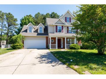 Charming two-story home with a well-manicured lawn and inviting curb appeal at 4642 Laurendale Ct, Rock Hill, SC 29732