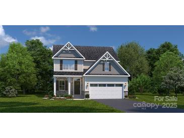 Charming two-story home featuring a mix of siding, stone accents, well-manicured lawn, and a two-car garage at 518 Durango Way, Denver, NC 28037