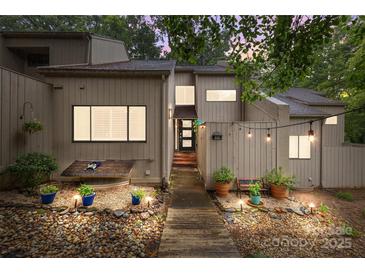 Charming townhouse featuring a private walkway, outdoor lighting and peaceful landscaping at 222 Riverview Ter, Clover, SC 29710