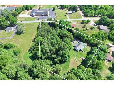 A high angle of the property showing surrounding greenery and the home's location on a generous, private lot at 4155 Slanting Bridge Rd, Sherrills Ford, NC 28673