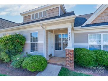 Inviting front entrance with well-maintained landscaping and classic architectural details including brick columns at 2153 Pavilion Ct, Rock Hill, SC 29732