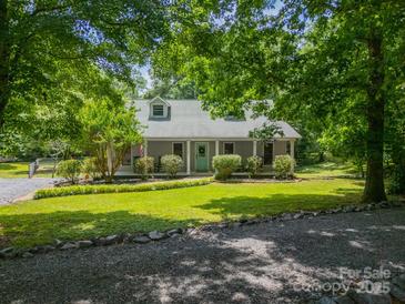 Charming one-story home with a well-manicured lawn, mature trees, and inviting curb appeal at 3387 Passmore Rd, Rock Hill, SC 29730