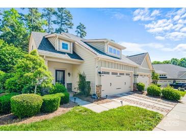 Charming home with a two-car garage, well-manicured lawn, and delightful curb appeal, perfect for suburban living at 204 Aztec Cir, Mooresville, NC 28117