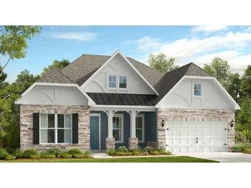Charming single-Gathering home with stone accents, a covered entryway, and an attached two-car garage at 3018 Tramore Dr, Harrisburg, NC 28075