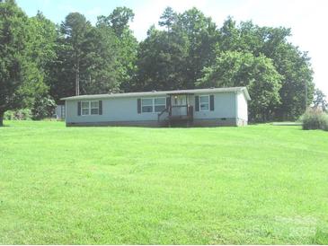 Well maintained single story home featuring a large lawn and traditional facade at 3942 Benny Shrum Ln, Maiden, NC 28650