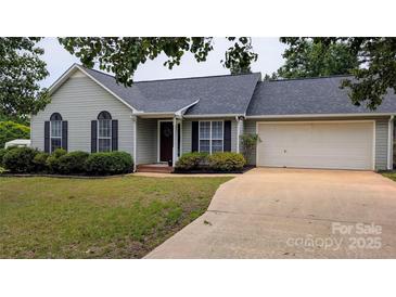 Charming single Gathering home with landscaped front yard and attached two car garage at 112 Brookshire Dr, Fort Mill, SC 29715