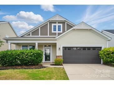 Charming single-Gathering home with a two-car garage, manicured lawn, and delightful curb appeal at 1957 Tablerock Dr # 59, York, SC 29745
