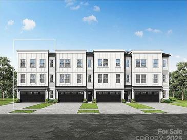 Modern townhome showcases a three-story facade with a private garage at 2134 Barrowcliffe Nw Dr # 0006, Concord, NC 28027