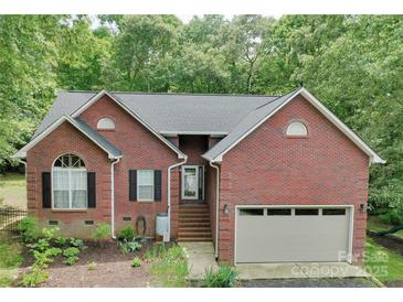 Charming brick home with attached garage and inviting front entrance at 7328 S Providence Rd, Waxhaw, NC 28173