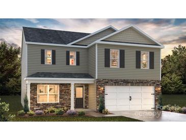 Charming two-story home with stone accents and well-maintained landscaping at 820 Candy Dr, Statesville, NC 28677