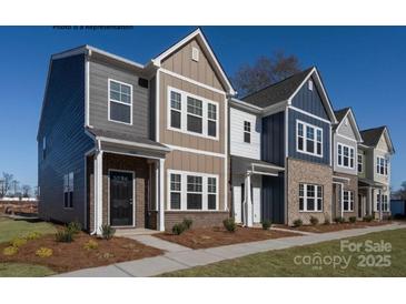 New townhomes boasting colorful exteriors and inviting front entrances at 483 Shasta St # 5202, Gastonia, NC 28052