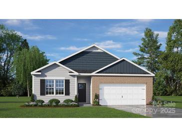 Charming single-story home featuring brick and siding accents, a two-car garage, and manicured landscaping at 3019 Sassafras Trl, Gastonia, NC 28056