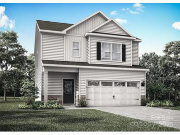 Charming two-story home with white siding, black shutters, and a two-car garage, surrounded by a well-manicured lawn at 1512 Doran Ter, Richburg, SC 29729