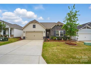Charming single-Gathering home with well-maintained lawn and a two-car garage at 1825 Lotus Ln, Denver, NC 28037