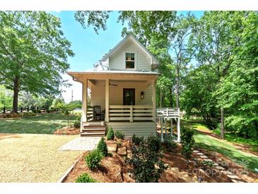 Charming home with a welcoming front porch, steps, and landscaped surroundings at 2268 New Gray Rock Rd, Fort Mill, SC 29708