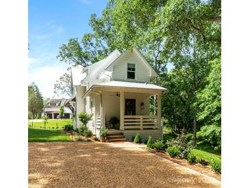 Charming two-story home with a welcoming front porch and well-manicured landscaping at 2268 New Gray Rock Rd, Fort Mill, SC 29708