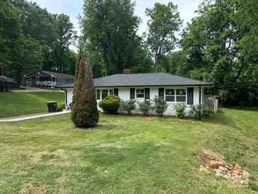 Charming single-story home with a well-manicured lawn and classic black shutters at 518 Westside Cir, China Grove, NC 28023