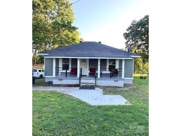 Charming single-story home with a cozy front porch and well-maintained lawn at 918 8Th St # 5, Lancaster, SC 29720